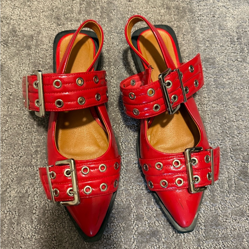 Red buckle loafers